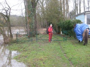  route inundated and path blocked by fences 